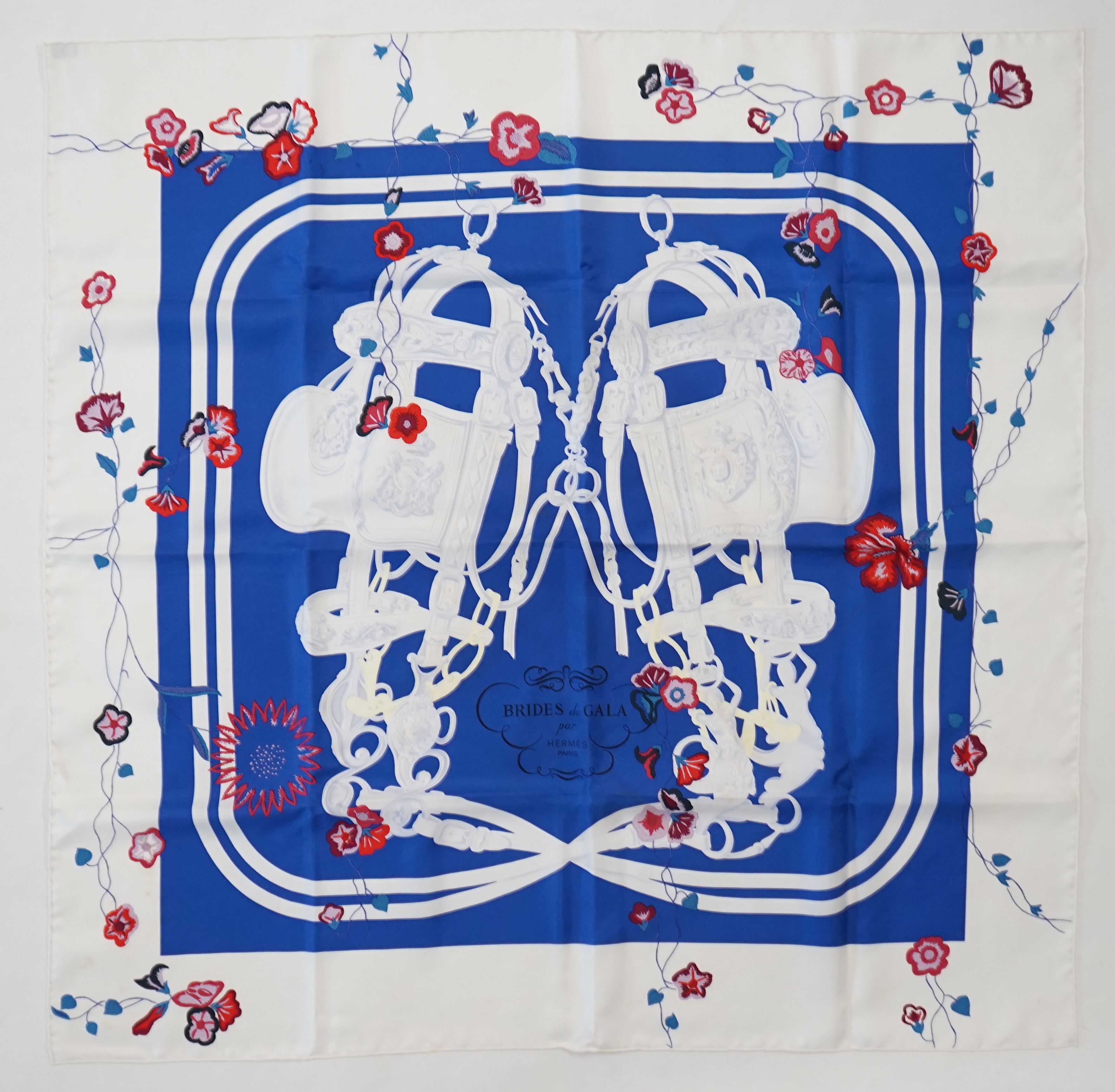 A white Hermès Brides de Gala silk scarf, approx 89cm x 88cm